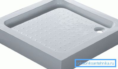 Pe o fotografie - un castron mic pătrat Pe o fotografie - un castron mic pătrat