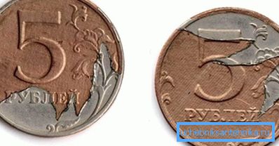 Stratul de placare deformat pe o monedă de 5 ruble. Stratul de placare deformat pe o monedă de 5 ruble.